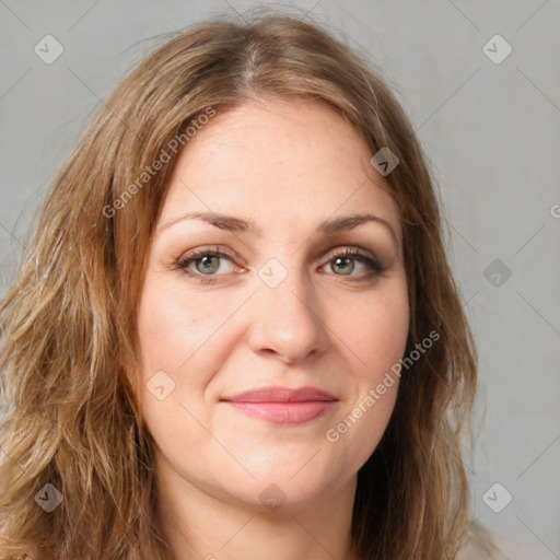 Joyful white young-adult female with long  brown hair and green eyes