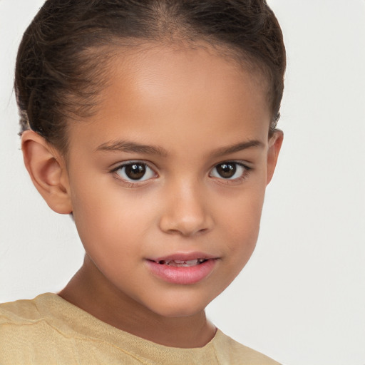 Joyful white child female with short  brown hair and brown eyes