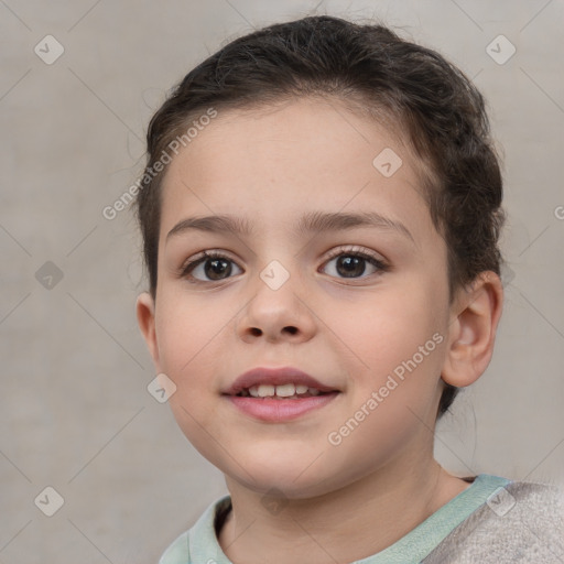 Joyful white child female with short  brown hair and brown eyes