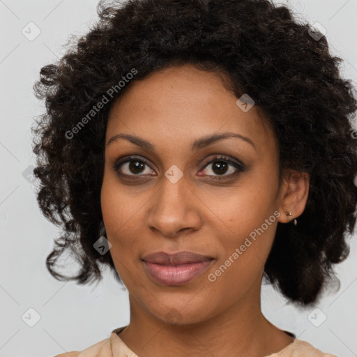 Joyful black young-adult female with medium  brown hair and brown eyes