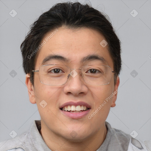 Joyful asian young-adult male with short  brown hair and brown eyes