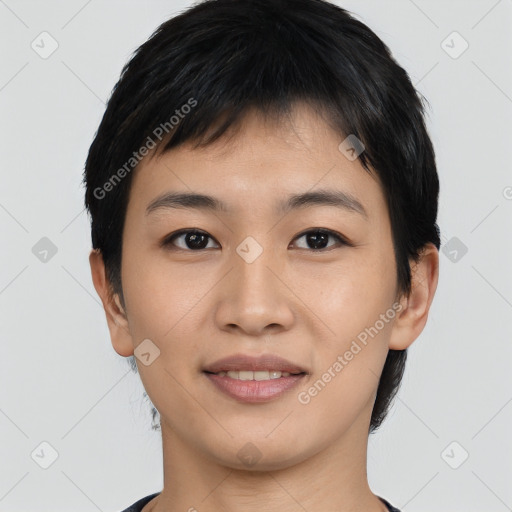 Joyful asian young-adult female with short  black hair and brown eyes