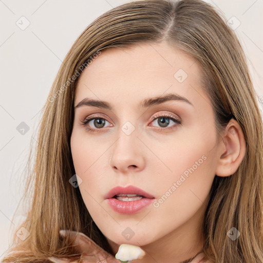 Neutral white young-adult female with long  brown hair and brown eyes