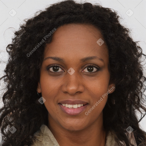 Joyful black young-adult female with long  brown hair and brown eyes