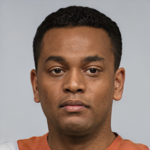 Neutral black young-adult male with short  black hair and brown eyes