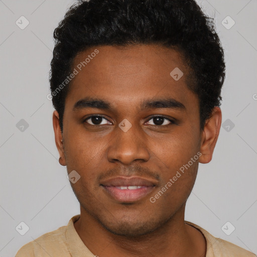 Joyful black young-adult male with short  brown hair and brown eyes
