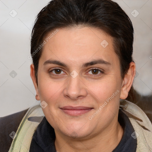 Joyful white adult female with medium  brown hair and brown eyes