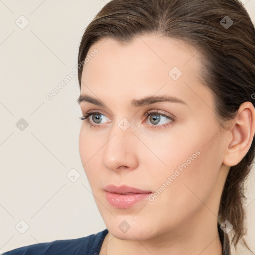 Neutral white young-adult female with medium  brown hair and grey eyes