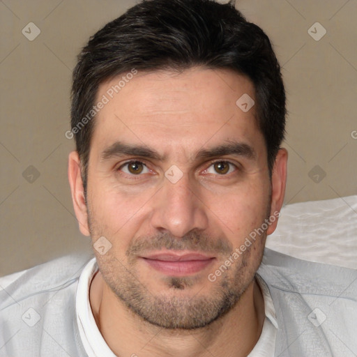 Joyful white adult male with short  brown hair and brown eyes