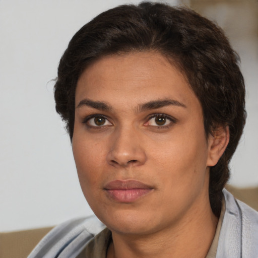 Neutral white young-adult female with short  brown hair and brown eyes
