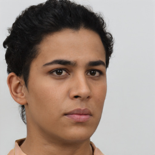 Neutral latino young-adult male with short  brown hair and brown eyes