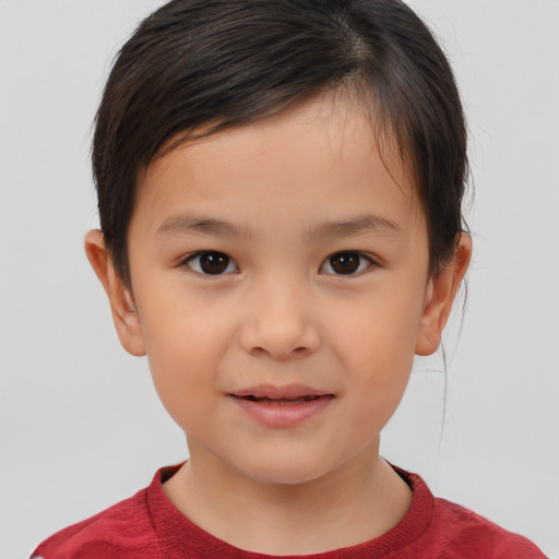 Joyful white child female with short  brown hair and brown eyes