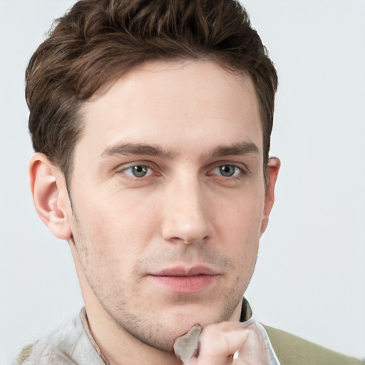 Neutral white young-adult male with short  brown hair and grey eyes