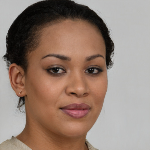 Joyful latino young-adult female with short  brown hair and brown eyes