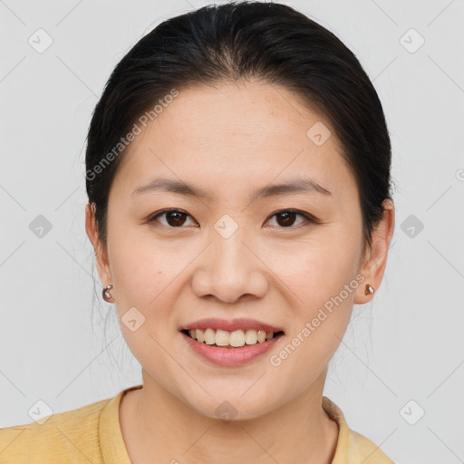 Joyful white young-adult female with medium  brown hair and brown eyes