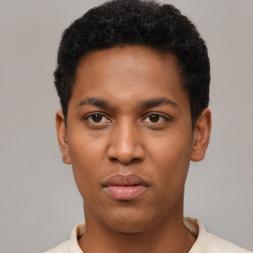 Neutral black young-adult male with short  black hair and brown eyes