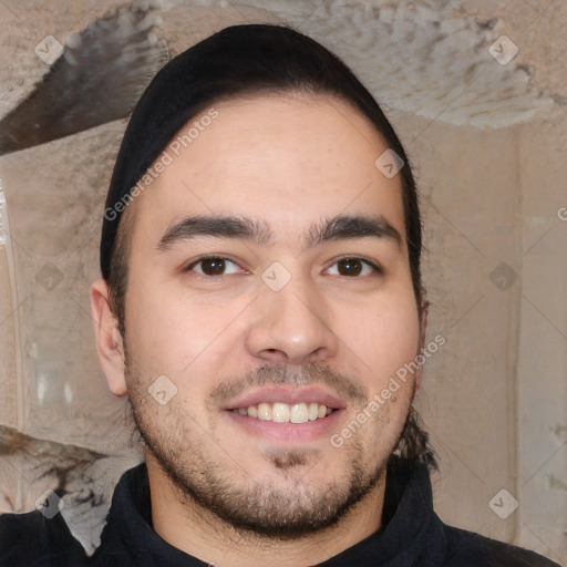 Joyful white young-adult male with short  black hair and brown eyes