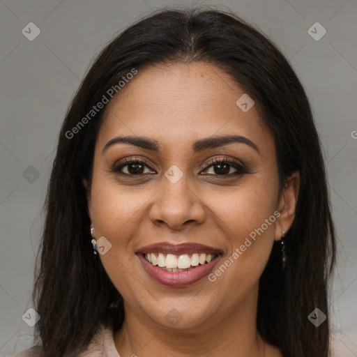 Joyful latino young-adult female with long  brown hair and brown eyes