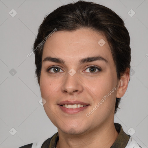 Joyful white young-adult female with medium  brown hair and brown eyes