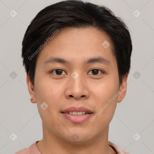 Joyful asian young-adult male with short  brown hair and brown eyes