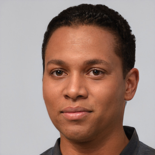 Neutral black young-adult male with short  black hair and brown eyes