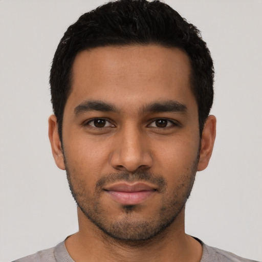 Neutral latino young-adult male with short  black hair and brown eyes