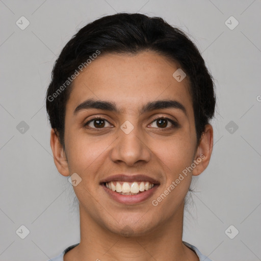 Joyful latino young-adult female with short  brown hair and brown eyes