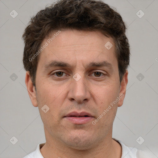 Neutral white adult male with short  brown hair and brown eyes