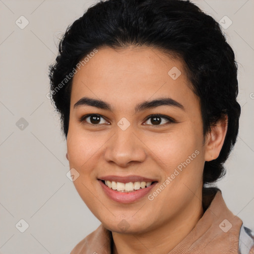 Joyful latino young-adult female with medium  brown hair and brown eyes