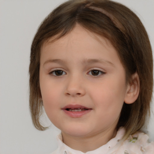 Neutral white child female with medium  brown hair and brown eyes