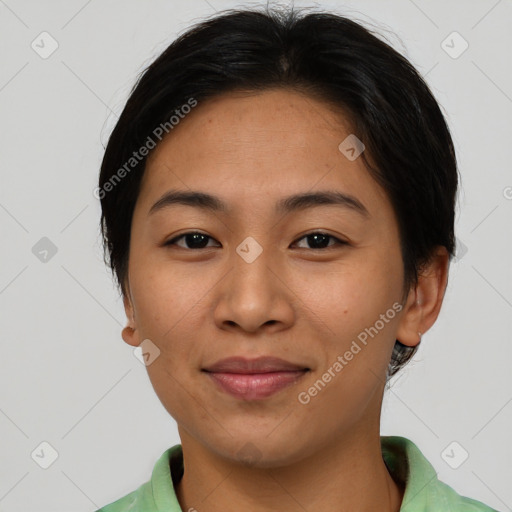 Joyful asian young-adult female with short  brown hair and brown eyes