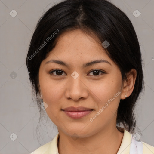 Joyful asian young-adult female with medium  brown hair and brown eyes