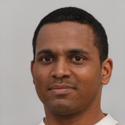 Neutral black young-adult male with short  black hair and brown eyes
