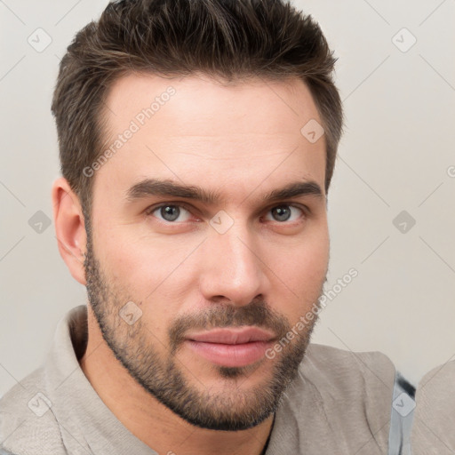 Neutral white young-adult male with short  brown hair and brown eyes