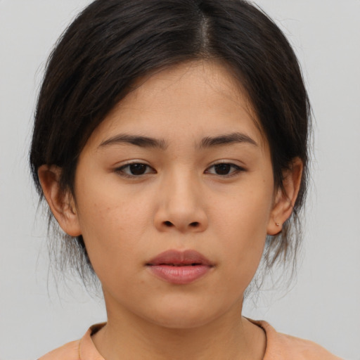 Neutral asian young-adult female with medium  brown hair and brown eyes