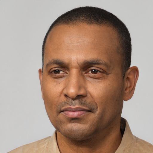 Neutral black adult male with short  black hair and brown eyes