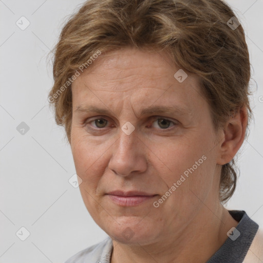 Joyful white adult female with short  brown hair and brown eyes