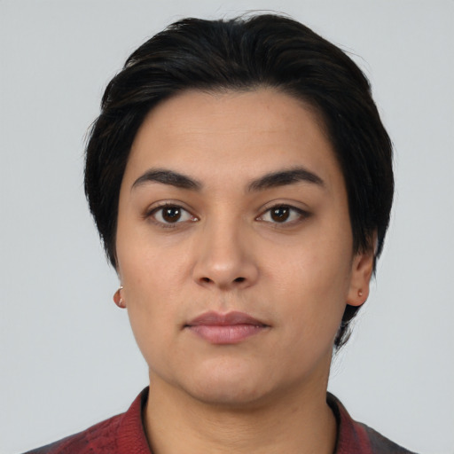 Neutral latino young-adult female with medium  black hair and brown eyes