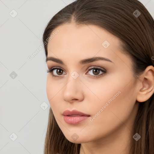 Neutral white young-adult female with long  brown hair and brown eyes