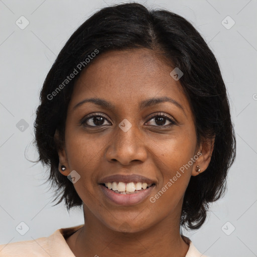 Joyful black young-adult female with medium  brown hair and brown eyes