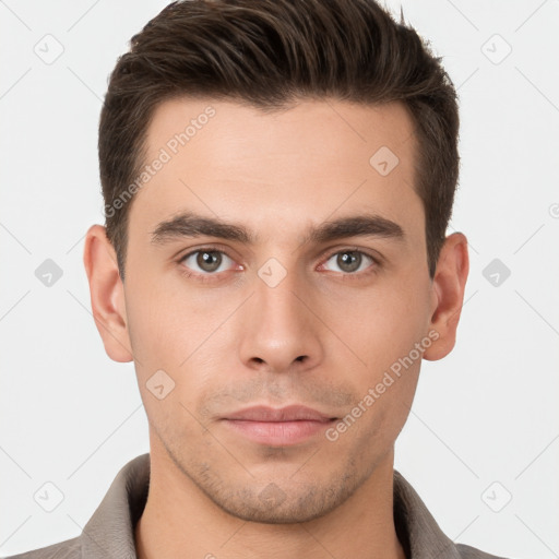 Neutral white young-adult male with short  brown hair and brown eyes