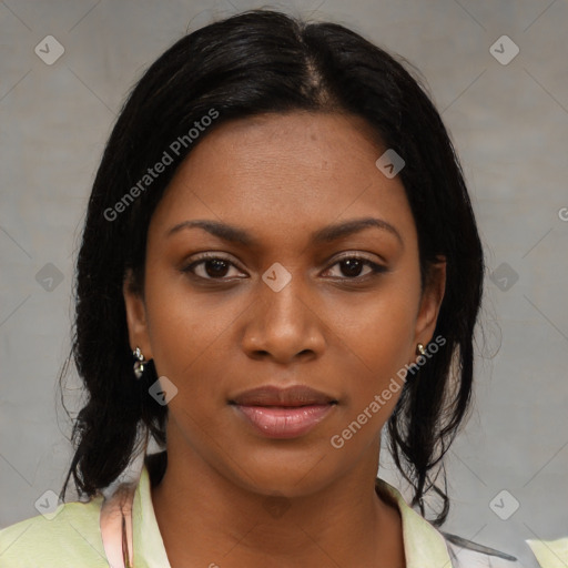 Joyful black young-adult female with medium  black hair and brown eyes