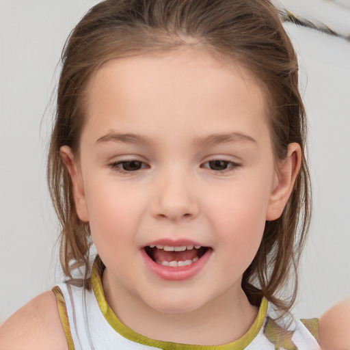 Joyful white child female with medium  brown hair and brown eyes