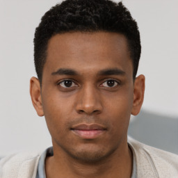 Neutral black young-adult male with short  brown hair and brown eyes