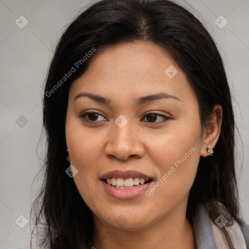 Joyful latino young-adult female with long  brown hair and brown eyes