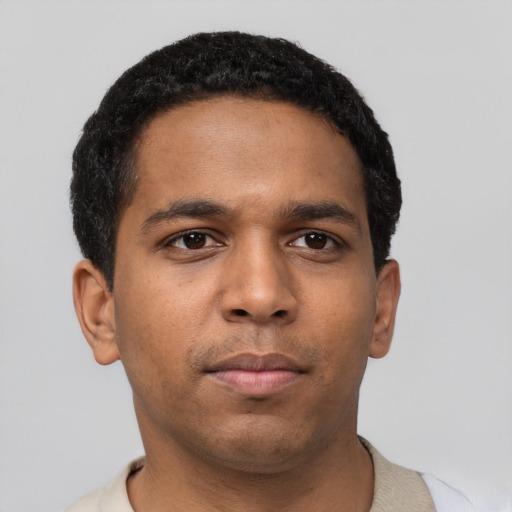 Neutral black young-adult male with short  black hair and brown eyes
