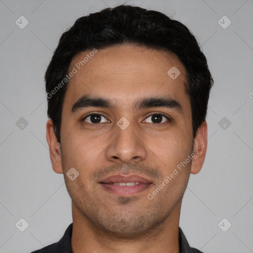 Joyful latino young-adult male with short  black hair and brown eyes