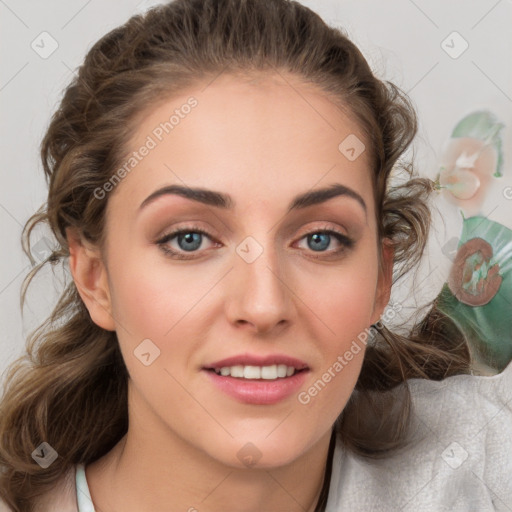 Joyful white young-adult female with medium  brown hair and blue eyes