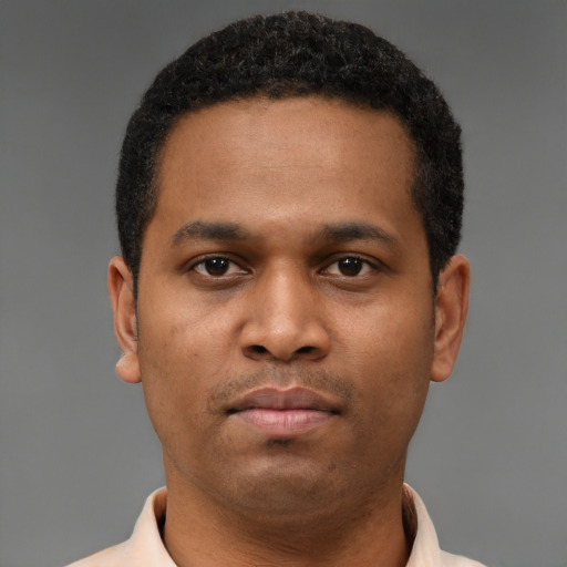 Neutral latino young-adult male with short  brown hair and brown eyes