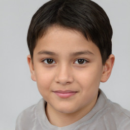 Joyful white child female with short  brown hair and brown eyes